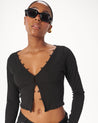 blusa-negra-botones-manga-larga
