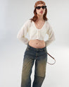 Vista lateral Cardigan Gally blanco mostrando hombro caído - Urbanrock

